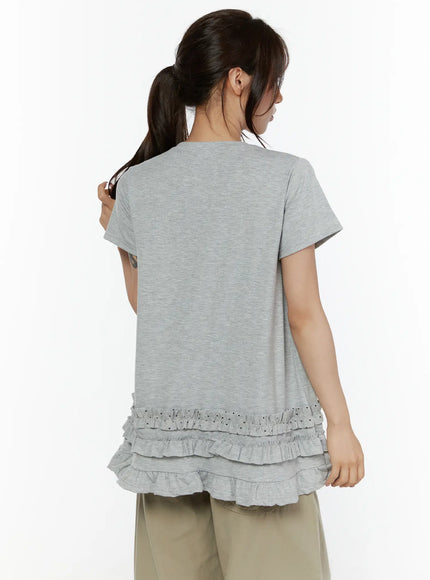 Polka Dot Frill Tee CL507 Gray back shot model showing clean A-line back panel with three-tier ruffle hem and polka dot frill in heather gray cotton