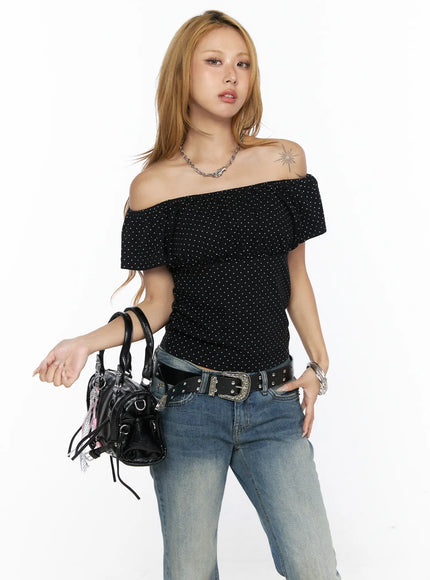 LEWKIN Polka Dot Frill Two-Way Tee CL528 Black S/M front shot on model wearing off-shoulder style with white dot print, styled with blue jeans and black bag