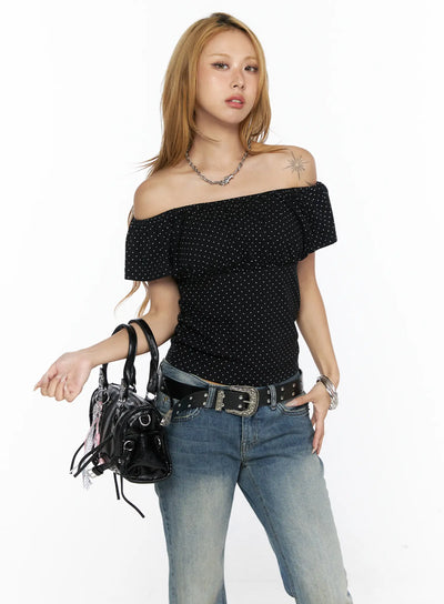 LEWKIN Polka Dot Frill Two-Way Tee CL528 Black S/M front shot on model wearing off-shoulder style with white dot print, styled with blue jeans and black bag