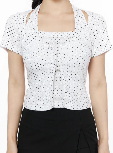 Polka Dot Halter Layered Tee IU525 White close-up front detail on model, square neckline with cut-out halter strap, button-front closure and ruched center detail