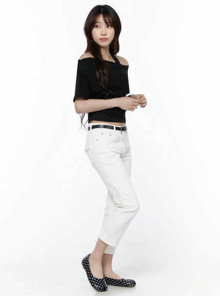 Polka Dot Layered Halter Neck T-Shirt IL506 Black side model shot standing with arms crossed showing off-shoulder neckline and ruched crop length with white jeans