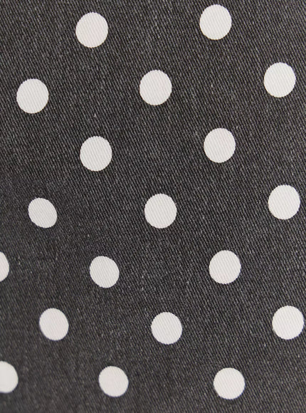 Polka Dot Mini Shorts IL506 close-up fabric detail showing white polka dots on dark charcoal grey twill weave texture