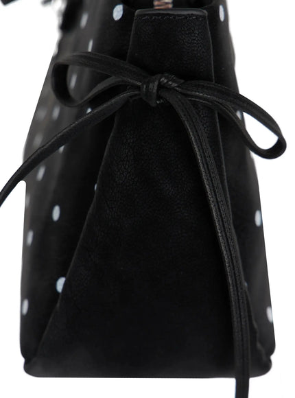 Polka Dot Ribbon Shoulder Bag IL523 Black close-up side detail shot black leather knot tie closure at end panel showing mixed suede and pebbled leather texture with polka dot fabric