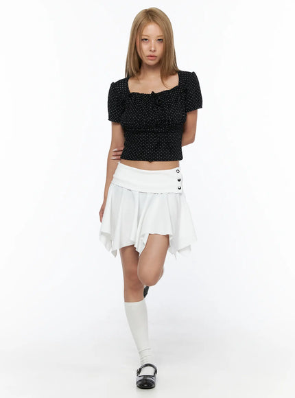 Polka Dot Shirred Puff Sleeve Top CU524 Black front view model standing full-body white knee socks polka dot crop top with tie bow detail