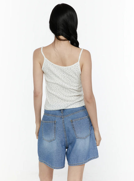 Puff Sleeve Floral Cami Top IL506 White back shot on model showing cami back with thin straps and small floral print, paired with denim shorts