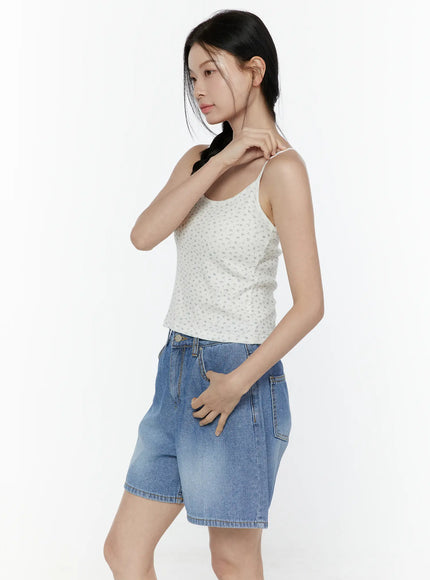 Puff Sleeve Floral Cami Top IL506 White side shot on model touching shoulder, cami worn without puff sleeve overlay showing slim strap silhouette