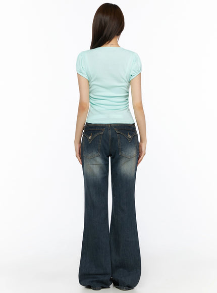 Puff Sleeve Tee IL523 Mint full-length back shot on model showing puff sleeve back view ruched fabric fitted waist with flare jeans white belt