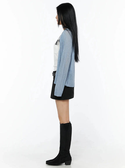 Raglan Sheer Open Knit Cardigan IL509 Light blue full-body side shot model profile view showing sheer open-knit silhouette length and sleeve structure over black mini skirt