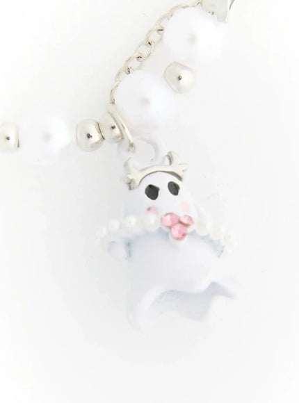 Raven Halloween Bracelet IL522 white close-up detail of white ghost charm with black eye detail, pink crystal embellishments and silver crown, on pearl bead strand