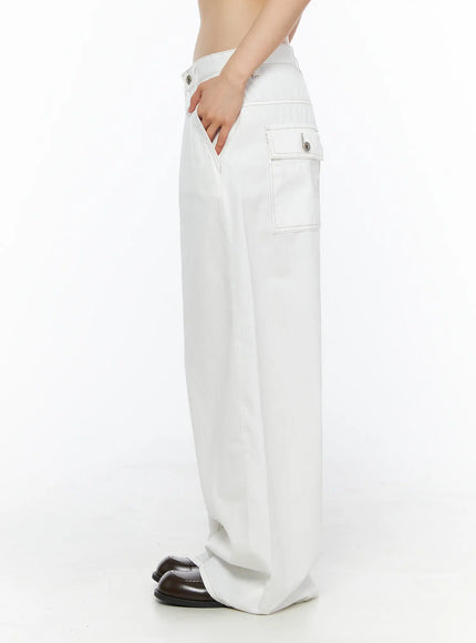 Relaxed Fit Baggy Pants CL502 White side view on model showing back flap pocket contrast stitching and wide-leg drape with brown loafers