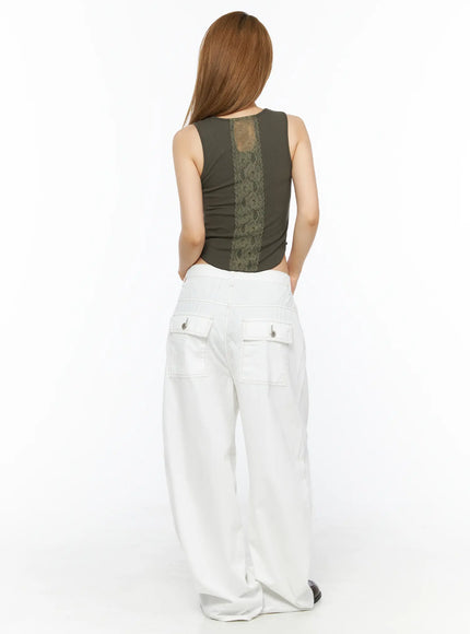 Relaxed Fit Baggy Pants CL502 White back view headless model showing dual flap cargo pockets silver snap buttons and contrast topstitching close-up