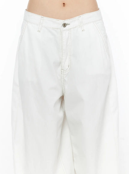 Relaxed Fit Baggy Pants CL502 White close-up detail of front waistband silver button low-rise fit and tonal contrast stitching on cotton fabric