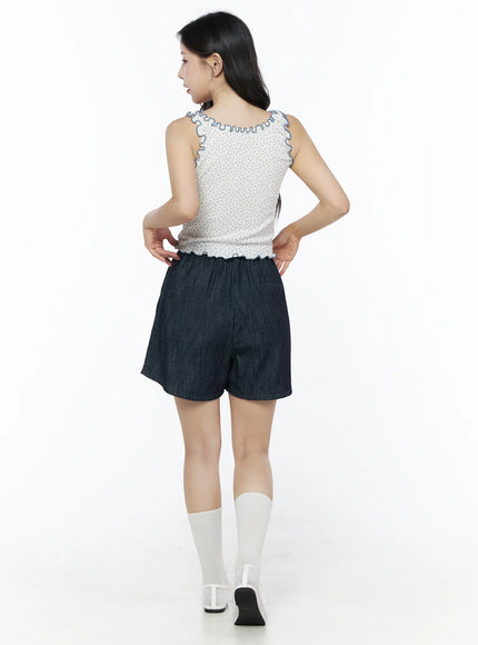 Relaxed-Fit Pintuck Shorts IU525 Dark blue back full-body model shot showing elastic waistband relaxed fit and denim herringbone texture