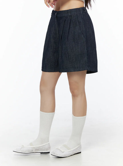 Relaxed-Fit Pintuck Shorts IU525 Dark blue side view on model showing pleated front panel wide-leg silhouette and elastic back waistband