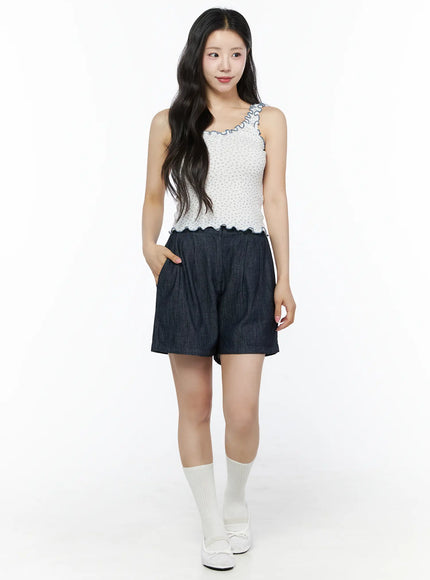 Relaxed-Fit Pintuck Shorts IU525 Dark blue full-body front model shot styled with ruffled tank top hand in pocket white socks and ballet flats
