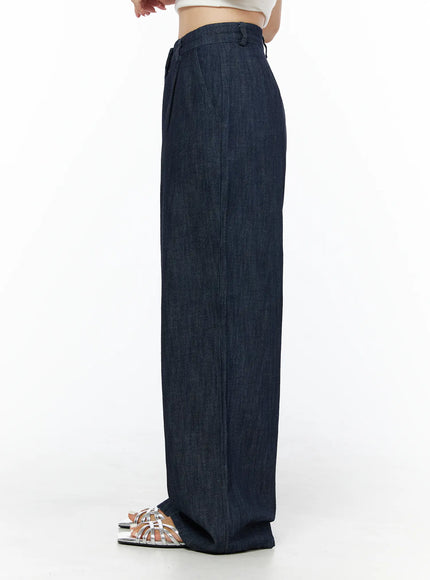 Relaxed-Fit Wide-Leg Pants IU525 Dark blue side shot on model showing slim high waist and dramatically wide flared leg denim silhouette with silver sandals