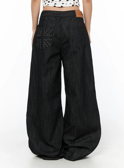 Rene Studded Wide Leg Jeans CU524 Black back view on model showing stud-embellished back pocket with cross pattern and leather brand patch