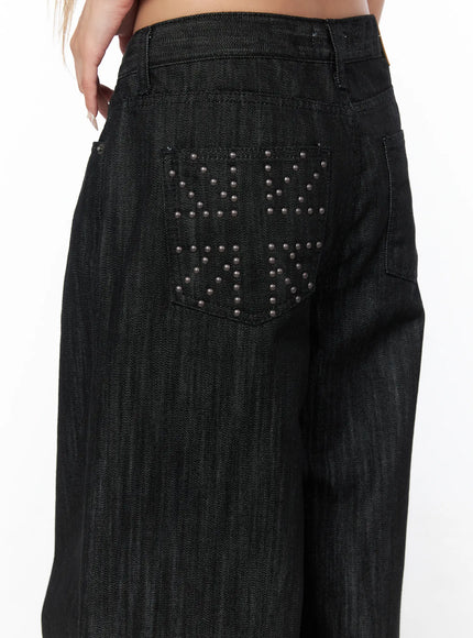 Rene Studded Wide Leg Jeans CU524 Black close-up detail of back stud-embellished pocket showing cross pattern studs and leather label on waistband