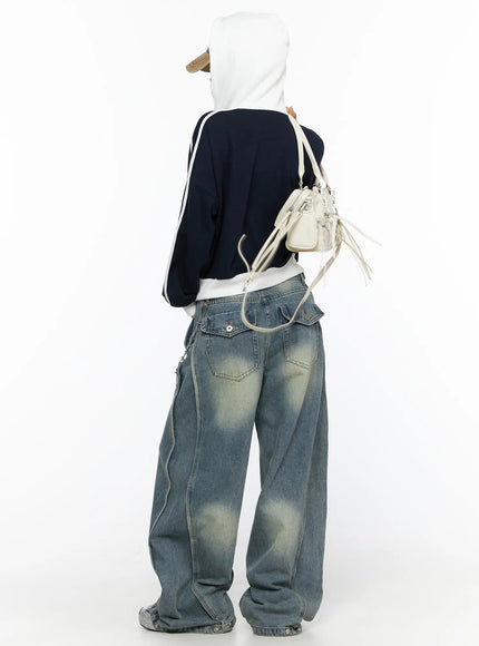 LEWKIN Rey Vintage Washed Wide Leg Jeans CL524 Blue back shot on model wearing navy hoodie and cap, showing wide-leg silhouette and faded wash