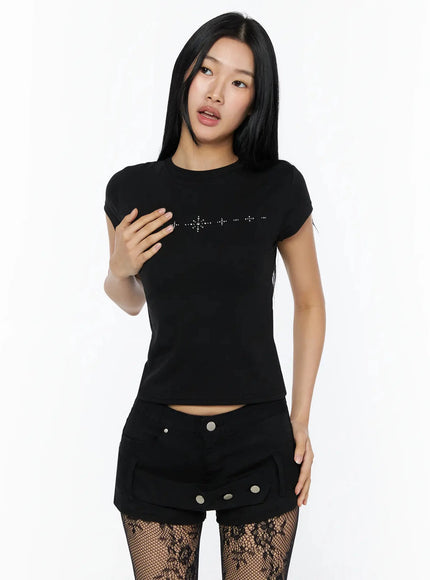 Rhinestone Slim Fit Short Sleeve Tee IL509 Black front shot on model with hand gesture showing silver rhinestone star chest embellishment
