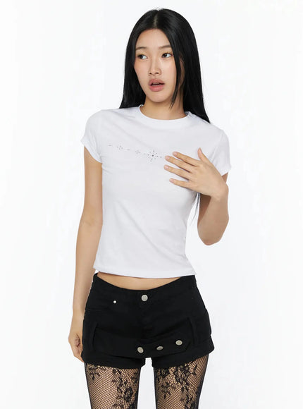 Rhinestone Slim Fit Short Sleeve Tee IL509 White front shot on model with hand on chest highlighting rhinestone star motif on cotton fabric