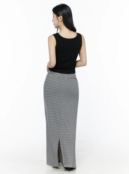 Ribbed Button Tank Top IU525 Black back model shot showing back neckline and smooth ribbed fabric with back slit detail on striped maxi skirt