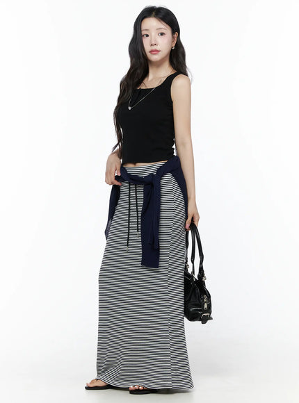 Ribbed Button Tank Top IU525 Black full-length side model shot showing fitted silhouette paired with striped maxi skirt navy cardigan tied at waist and sandals