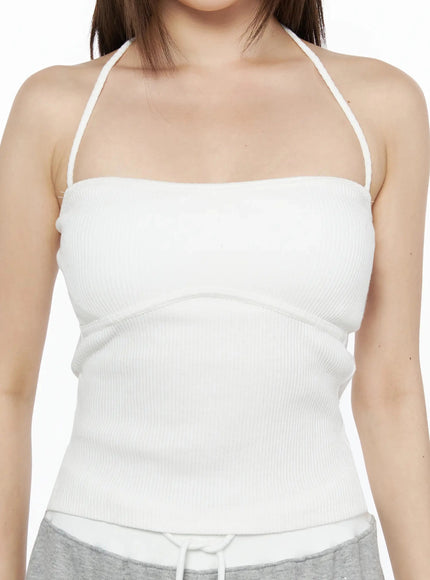 Ribbed Halter Sleeveless Top IL515 White close-up front detail on model showing ribbed texture bust seam and halter neck strap S/M