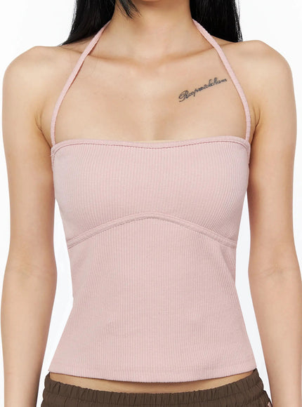 Ribbed Halter Top IL509 Pink close-up front detail shot on model showing halter neck tie ribbed texture and curved bust seam line
