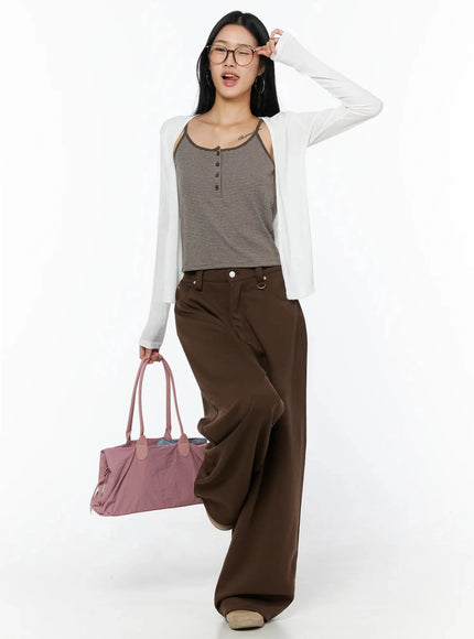 LEWKIN Ribbed Open Knit Cardigan IL509 White S/M full-body front shot on model walking, styled with striped cami and brown wide-leg trousers, carrying pink bag