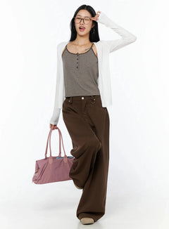 LEWKIN Ribbed Open Knit Cardigan IL509 White S/M full-body front shot on model walking, styled with striped cami and brown wide-leg trousers, carrying pink bag