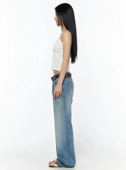 Ribbed Sleeveless Top IL509 White side full-body shot, model standing profile facing left, ribbed crop cami showing straight hem and spaghetti strap silhouette