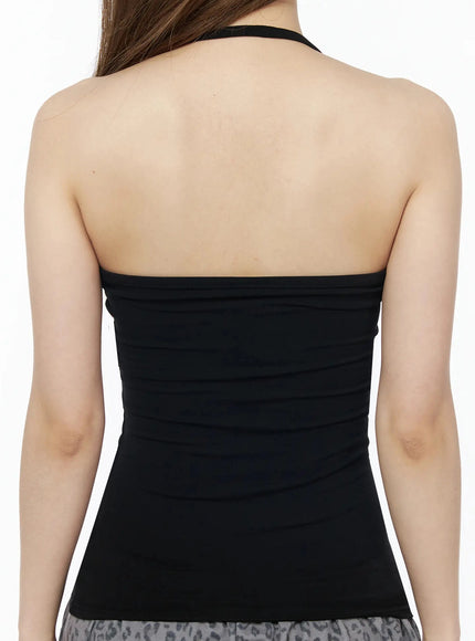 Ribbed Slim Fit Halter Top IU525 Black back close-up shot on model showing open backless halter design with ruched body fabric detail