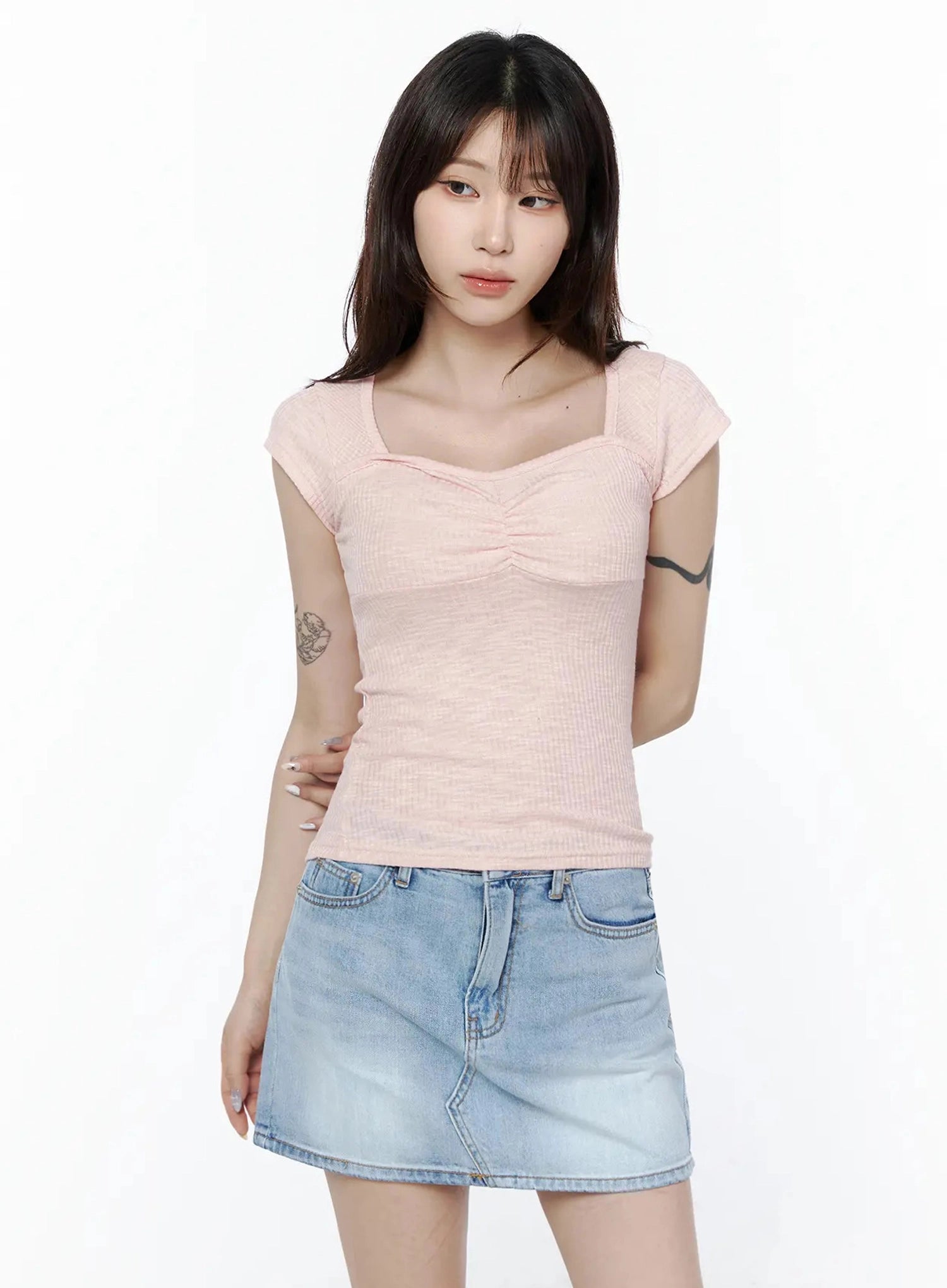 Ribbed Square Neck Knit Top IL502 Pink front shot on model cropped waist-up view hand on chest showing square neckline ruched center detail