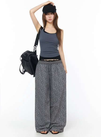 Ribbed Square Neck Padded Tank Top IU525 Dark gray full outfit front shot on standing model with black cap and crossbody bag, wide-leg leopard pants, street style