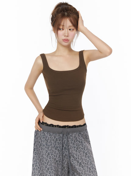 Ribbed Square Neck Padded Tank Top IU525 brown front shot on model with updo, square neckline, ribbed texture, styled with gray leopard wide-leg pants