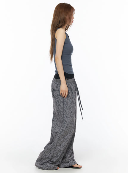Ribbed Square Neck Padded Tank Top IU525 Dark gray side shot on standing model showing profile, ribbed texture, long drawstring detail on leopard pants