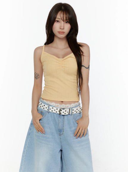 Ribbed V-Neck Cami Top CL508 Yellow close-up front shot on model highlighting ruched V-neckline and ribbed pointelle knit texture with lace waistband peek