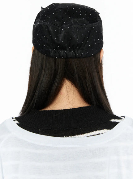 Ribbon Cubic Hat CL517 Black back view on model showing rhinestone-studded satin cap with elasticated rear band and allover sparkle texture