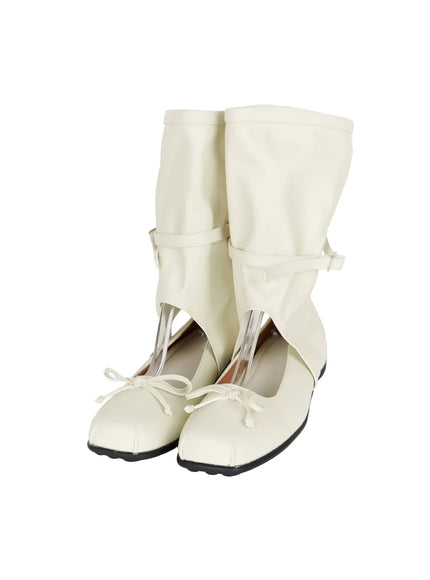 Ribbon Flat Ankle Boots CL507 Light beige front flat shot on shoe stand showing pair with bow tie toe cap buckle ankle strap and gaiter shaft