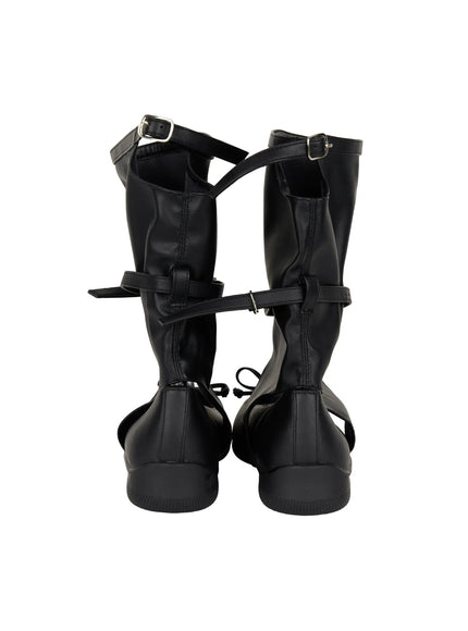 Ribbon Flat Ankle Boots CL507 Black back flat shot on shoe stand showing pair with rear seam silver buckle straps open heel cutout and black outsole