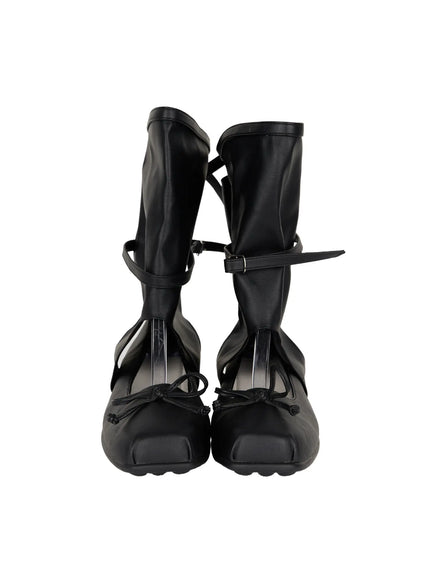 Ribbon Flat Ankle Boots CL507 Black front flat shot on shoe stand showing pair with bow tie toe detail adjustable buckle strap and soft gaiter upper