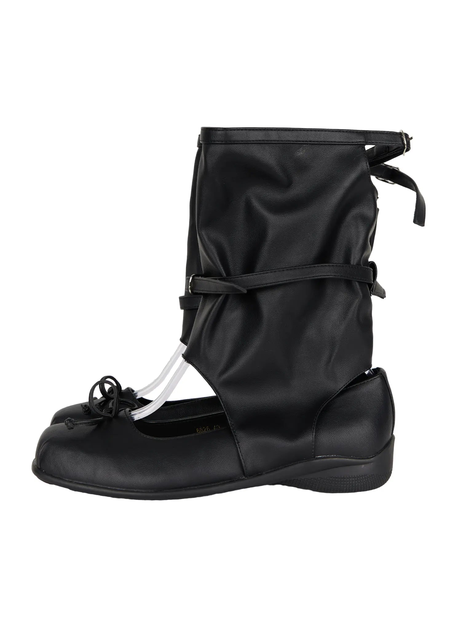 Ribbon Flat Ankle Boots CL507 Black side flat shot on shoe stand showing single boot with slouchy faux-leather gaiter wrap buckle strap and bow toe