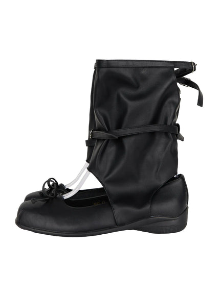 Ribbon Flat Ankle Boots CL507 Black side flat shot on shoe stand showing single boot with slouchy faux-leather gaiter wrap buckle strap and bow toe