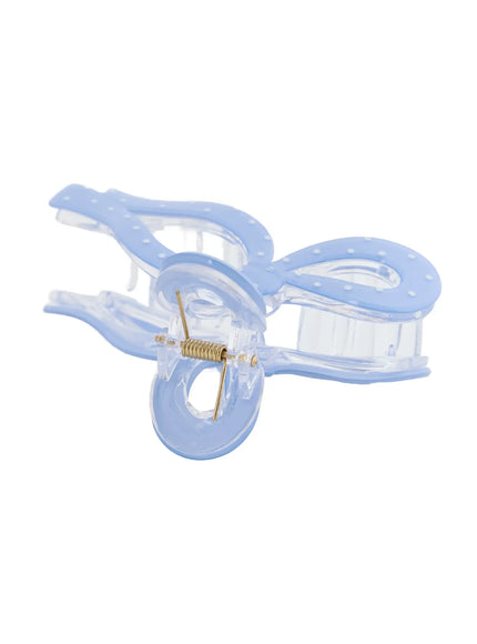 Ribbon Hair Pin IL514 blue close-up detail of gold spring hinge and clear claw interior with polka dot blue bow frame