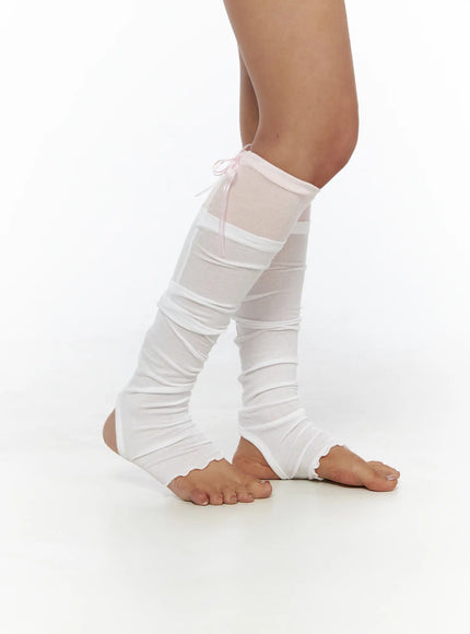 LEWKIN Ribbon Layered Leg Warmers CL503 Pink side view on model showing sheer mesh panel, ruched white knit layers, and pink ribbon tie at calf
