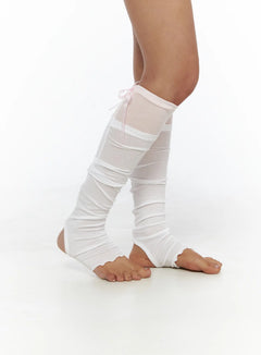 LEWKIN Ribbon Layered Leg Warmers CL503 Pink side view on model showing sheer mesh panel, ruched white knit layers, and pink ribbon tie at calf