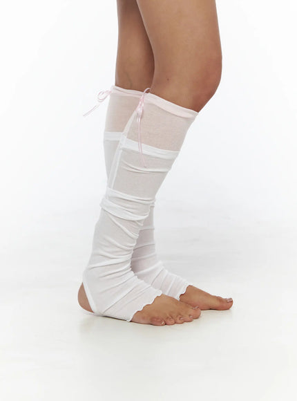 Ribbon Layered Leg Warmers CL503 Pink side view on model single leg raised, showing pink ribbon tie, sheer mesh top section and white ruched knit body