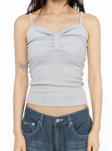 Ribbon Strap Cami CU530 Gray close-up front torso shot on model, highlighting center ruched bow-like bust detail and ribbed texture of gray crop cami