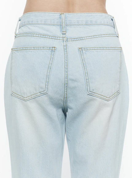 Ripley Light Washed Flared Jeans IL506 Light blue close-up back detail shot showing dual patch pockets contrast gold stitching waistband and denim texture